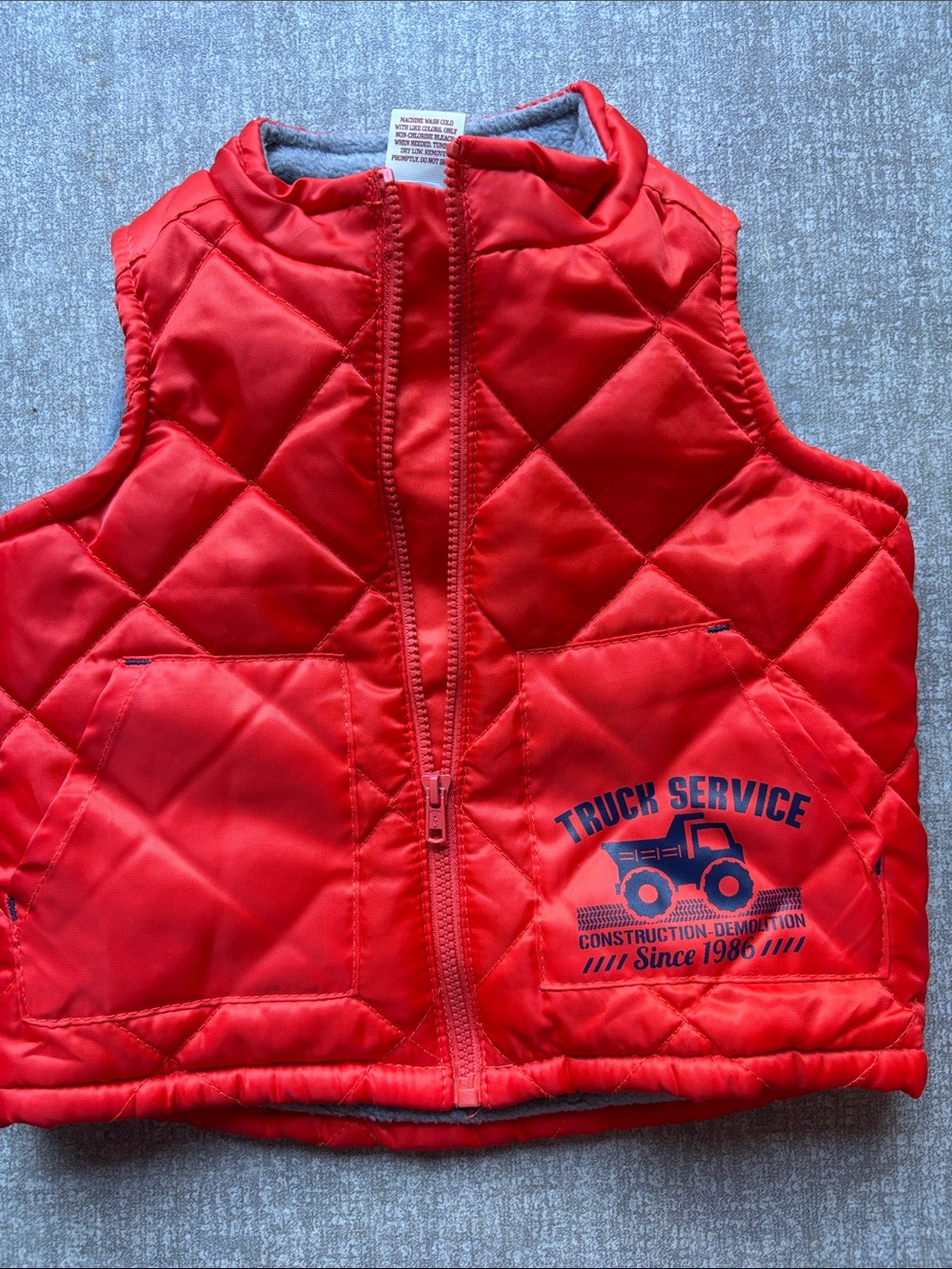 Arizona Jean Company Orange Quilted Kids Vest with Truck Graphic